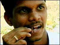 Ramesh Kumar eating a cockroach